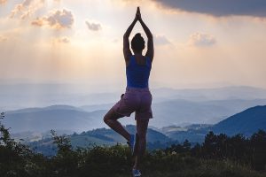Woman doing yoga in nature.